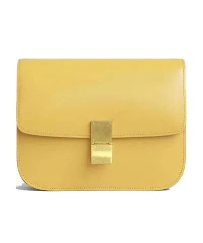 Celine Classic Medium Cow Leather Polished Handbag In Yellow