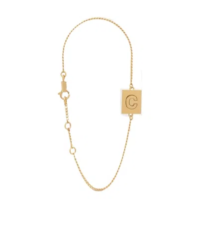 Celine Gold Decorated Brass Letter C Bracelet In Yellow