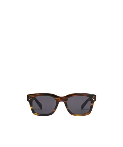 Celine Logo Sunglasses In Brown