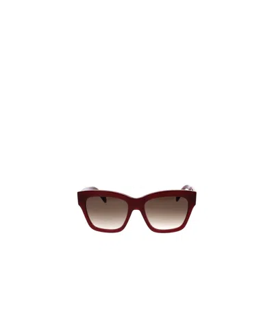 Celine Logo Sunglasses In Brown