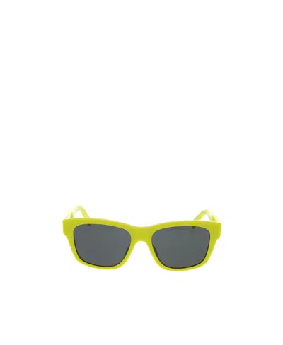 Celine Logo Sunglasses In Yellow