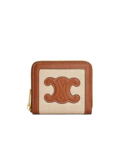 Celine Logo Zipper Wallet In Brown