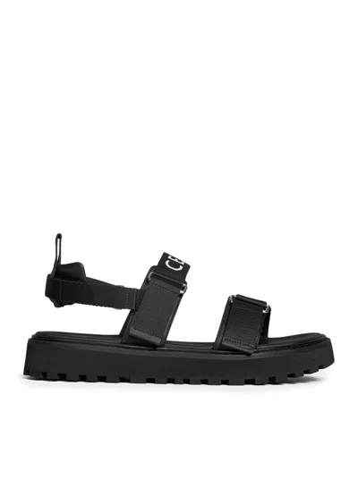CELINE CELINE MEN BILLIE CELINE STRAPPLE SANDAL IN “CELINE” JACQUARD AND CALFSKIN
