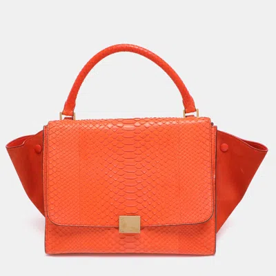 Pre-owned Celine Orange Python And Suede Medium Trapeze Bag