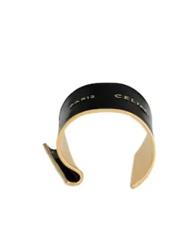 Celine Ribbon Large Cuff In Enamel And Brass With Gold Finish In Black