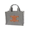 Celine Cabas Thais Shoulder Bag In White/black