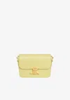 Celine Women Teen Triomphe Leather Crossbody Bag In Yellow