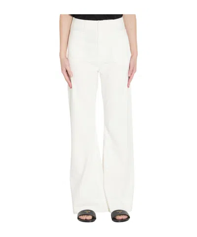 Celine Triomphe Flared Jeans In White