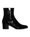 Celine Women Patent Leather Boots With Engraved Triomphe Logo In Black