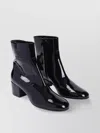 Celine Women Patent Leather Boots With Engraved Triomphe Logo In Black