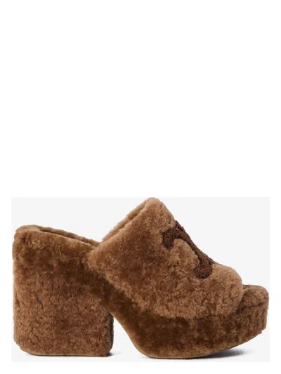 Celine Women's Shearling Mules In Brown
