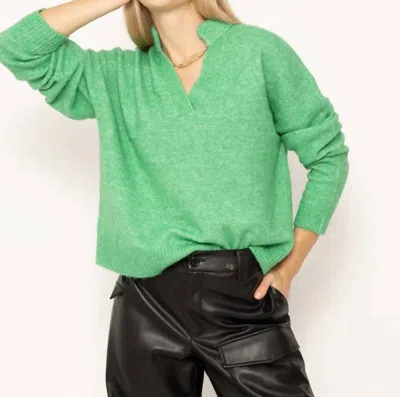 Central Park West Lilia Slash Funnel Neck In Green