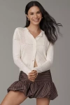 Central Park West Lilla Pointelle Cardigan Sweater In White