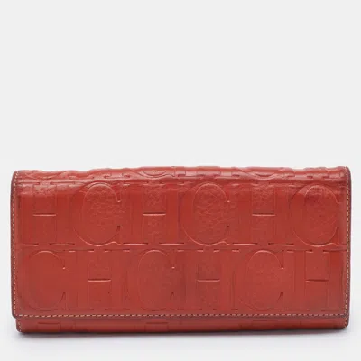 Ch Carolina Herrera Rust Orange Monogram Leather Flap Continental Wallet In Red