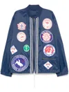 Champion Drawstring Hem Bomber With Elastic Cuffs And Patches In Blue