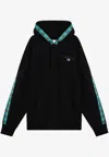 Champion X Angelo Baque Logo Patch Hooded Sweatshirt In Black