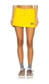 Champion X Guizio Micro Mini Skirt In Yellow Cab