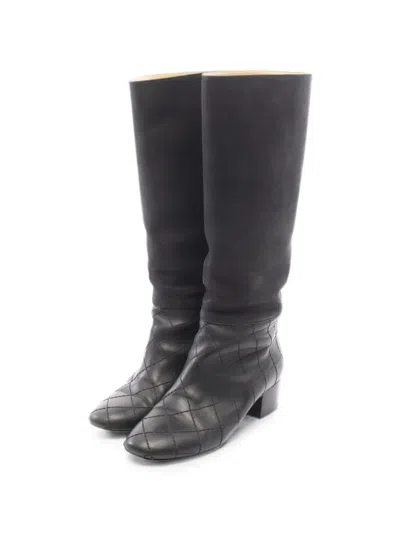 Pre-owned Chanel 1986-1988 Coco Mark Quilted Boots In Black