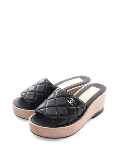 Pre-owned Chanel 1986-1988 Matelassé Wood Sole Mule Sandals In Black