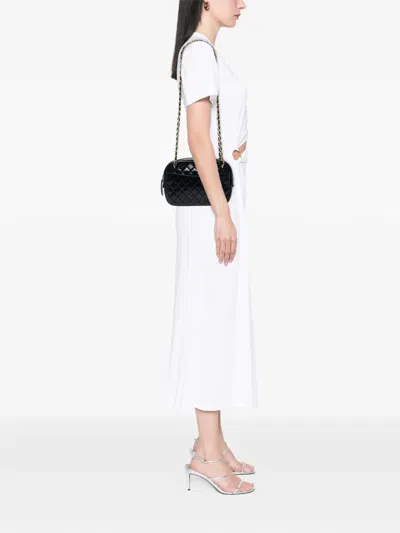 Pre-owned Chanel 1989-1991 Cc Quilted Lambskin Chain Camera Bag Crossbody Bag In Black