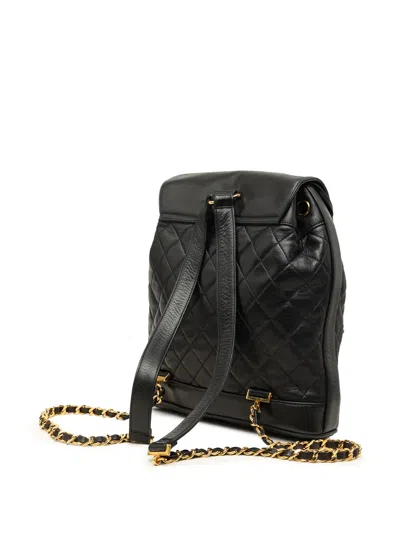 Pre-owned Chanel 1991-1994 Large Cc Quilted Lambskin Drawstring Backpack In Black