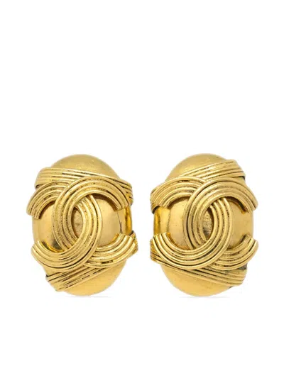 Pre-owned Chanel 1994 Cc-embossed Oval Clip-on Earrings In Gold