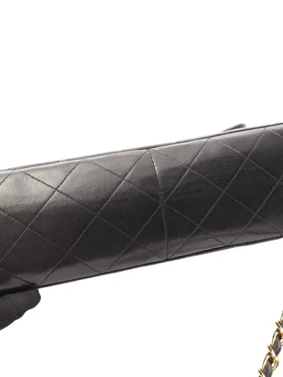 Pre-owned Chanel 1994-1996 Cc Quilted Lambskin Backpack In Black