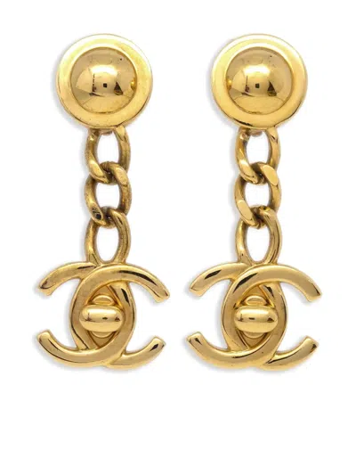 Pre-owned Chanel 1996 Cc Turn-lock Dangle Clip-on Earrings In Gold