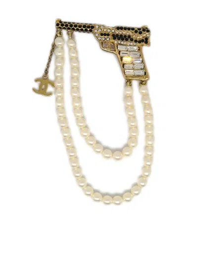 Pre-owned Chanel 2001 Gun Rhinestone-embellished Brooch In Gold