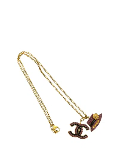 Pre-owned Chanel 2002 Gold Plated Rhinestone Cc And Camellia Hat Pendant Necklace Costume Necklace In Purple