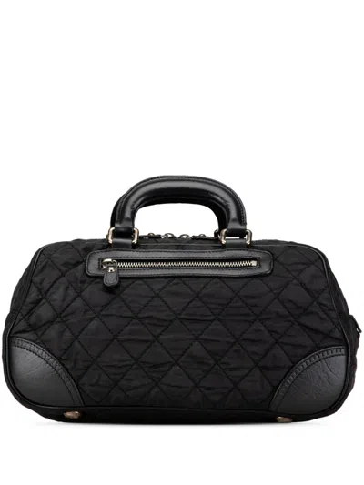 Pre-owned Chanel 2005-2006 Paris New York Quilted Nylon Duffle Handbag In Black