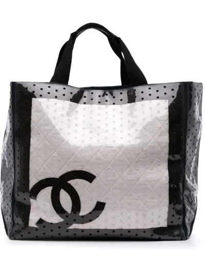 Pre-owned Chanel 2008-2009 Cc Quilted Cotton And Pvc Punching Tote Bag In Black