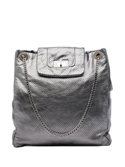 Pre-owned Chanel 2008-2009 Perforated Crackled Metallic Calfskin Drill Tote Bag In Silver