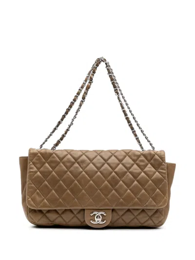 Pre-owned Chanel 2009-2010 Jumbo Quilted Lambskin Coco Rain Flap Shoulder Bag In Brown
