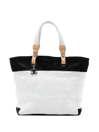 Pre-owned Chanel 2009-2010 Medium Bicolor Quilted Canvas Paris Biarritz Tote Bag In Black