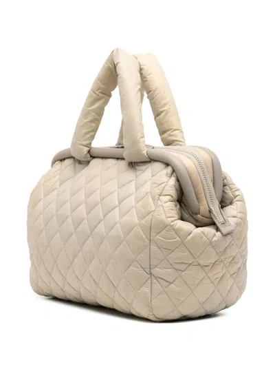 Pre-owned Chanel 2009-2010 Medium Nylon Coco Cocoon Bowling Bag Tote Bag In Brown