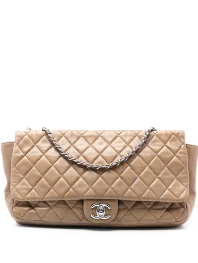 Pre-owned Chanel 2009-2010 Jumbo Quilted Lambskin Coco Rain Flap Shoulder Bag In Brown