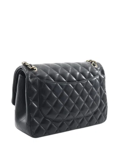 Pre-owned Chanel 2010-2025 Medium Classic Lambskin Double Flap Shoulder Bag In Black