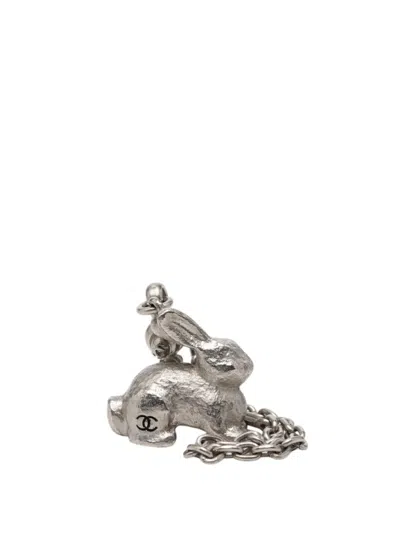 Pre-owned Chanel 2010-2026 Cc Brass Rabbit And Bag Charm Key Chain In Silver