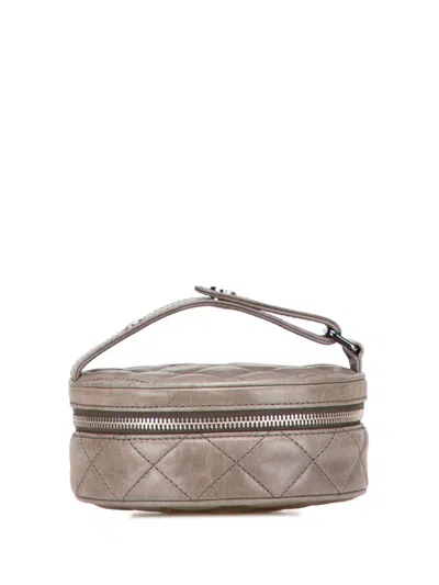 Pre-owned Chanel 2011 Cc Quilted Aged Calfskin Round Clutch Handbag In Brown