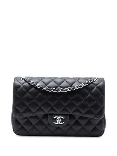 Pre-owned Chanel 2011 Jumbo Classic Lambskin Double Flap Shoulder Bag In Black