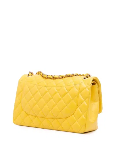 Pre-owned Chanel 2011 Jumbo Classic Lambskin Double Flap Shoulder Bag In Yellow