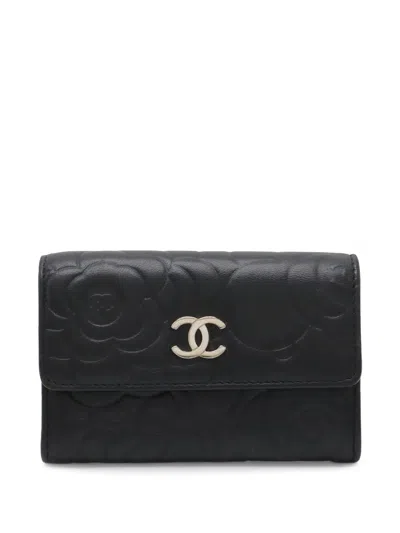 Pre-owned Chanel 2012 Cc Embossed Leather Camellia Card Holder In Black