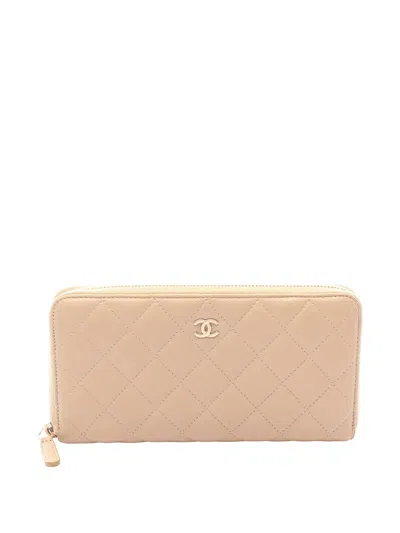 Pre-owned Chanel 2013-2014 Cc Quilted Lambskin Zip Around Wallet Long Wallets In Neutral
