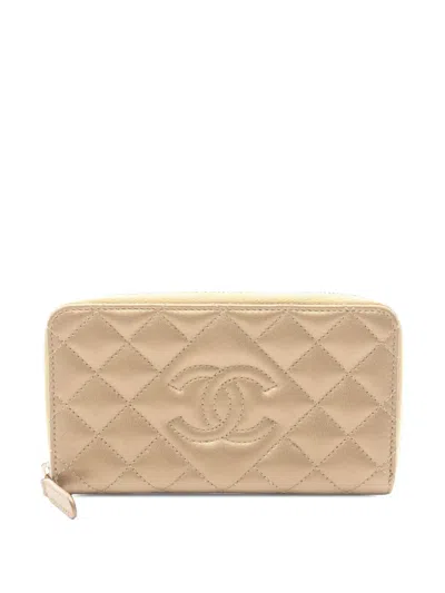 Pre-owned Chanel 2014 Cc Quilted Metallic Lambskin Zippy Long Wallet Small Wallets In Gold