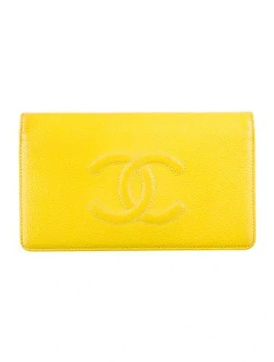 Pre-owned Chanel 2014 Interlocking Cc Logo Wallet In Yellow