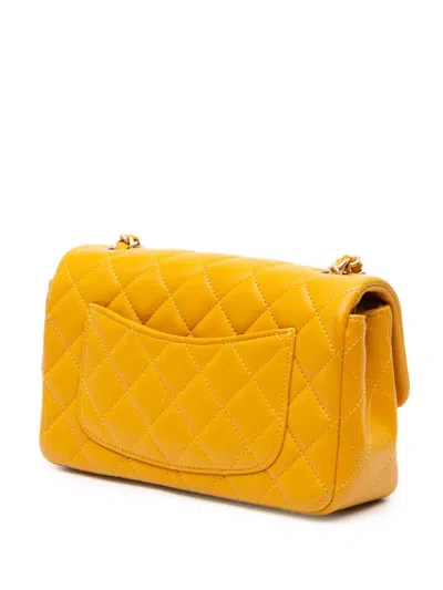 Pre-owned Chanel 2014 Mini Rectangular Classic Lambskin Single Flap Crossbody Bag In Yellow