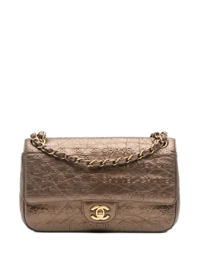 Pre-owned Chanel 2014 Paris Dallas Metallic Calfskin Embossed Logo Flap Shoulder Bag In Brown