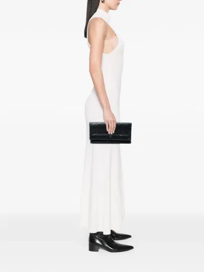 Pre-owned Chanel 2014 Quilted Lambskin Cc Beauty Foldover Clutch Bag In Black