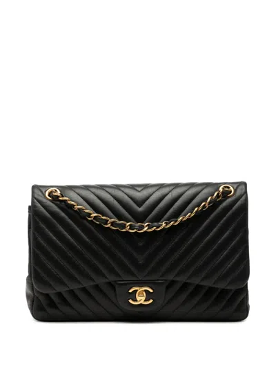 Pre-owned Chanel 2015-2016 Jumbo Classic Chevron Lambskin Double Flap Shoulder Bag In Black